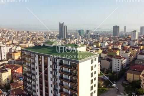 خرید آپارتمان فروشی با راه حل های کم هزینۀ زندگی در کارتال استانبول نمای ساختمان 4