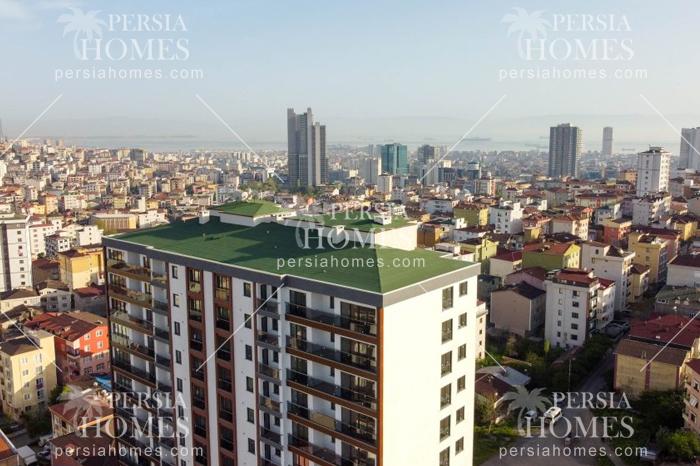 خرید آپارتمان فروشی با راه حل های کم هزینۀ زندگی در کارتال استانبول نمای ساختمان 4