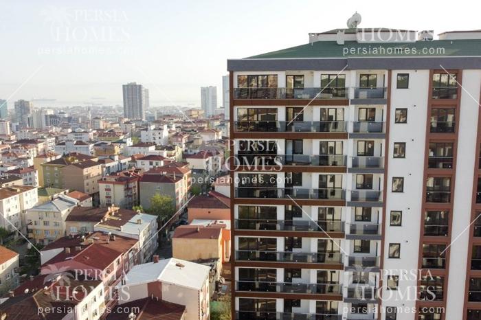 خرید آپارتمان فروشی با راه حل های کم هزینۀ زندگی در کارتال استانبول نمای ساختمان 2